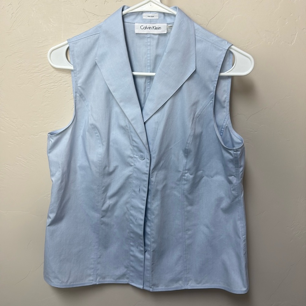 Calvin Klein sleeve less top. Robin egg blue. No iron, button front. Sz 8